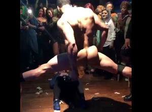 Bulky masculine stripper dancing in..